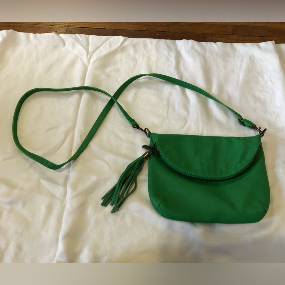 Green leather pocketbook zipper with fold-over top with snap closure